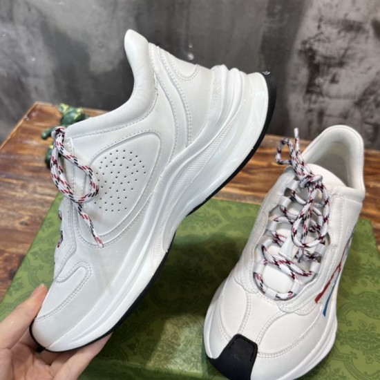 Gucci Run Leather Side-Stripe Trainers Off White medial view displaying perforated leather side panel in off white and red