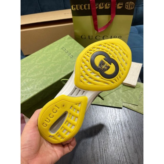 Gucci Run Trainer Rubber Outsole in black and yellow Bottom view of bright yellow tread outsole on Gucci Run trainer displaying logo details in black and yellow