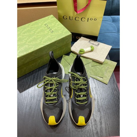Gucci Run Trainers Top View in black and yellow Top-down view of Gucci Run black knit trainers showing yellow laces and toe bumpers