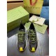 Gucci Run Trainers Top View in black and yellow Top-down view of Gucci Run black knit trainers showing yellow laces and toe bumpers