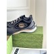 Side heel profile of Gucci grey and black trainer featuring layered sole construction