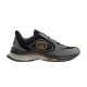 Side profile view of Gucci grey and black run chunky trainer showing logo panel