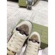 Gucci Screener GG Canvas - Toe Detail in beige Close-up of Gucci Screener toe boxes featuring GG canvas, purple trim, and Double G logo in beige
