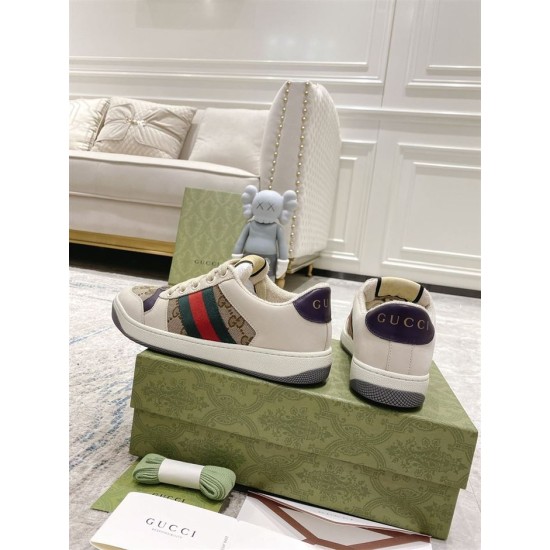 Gucci Screener Low Top Trainers - Rear View in beige Rear view of Gucci Screener trainers showing purple heel tabs with gold brand logo in beige