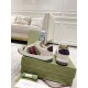 Gucci Screener Low Top Trainers - Rear View in beige Rear view of Gucci Screener trainers showing purple heel tabs with gold brand logo in beige