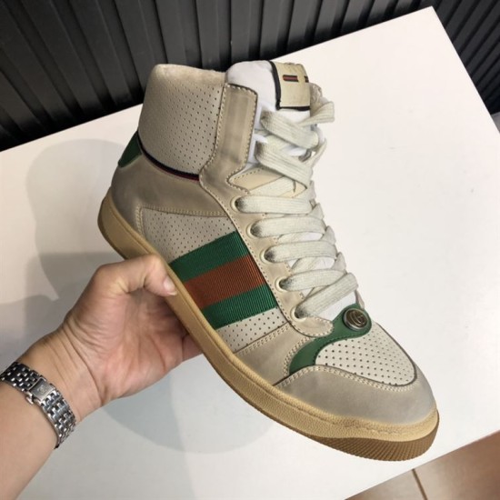 Hand holding off-white beige Gucci Screener high top trainer showing lateral profile
