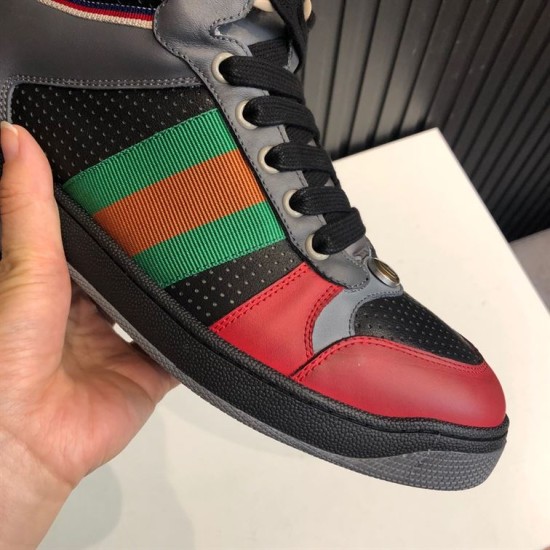 Gucci Screener High Top Trainer Web Stripe Close-Up in black and grey Close-up of green and orange Web stripe on Gucci Screener High Top Trainer in black and grey