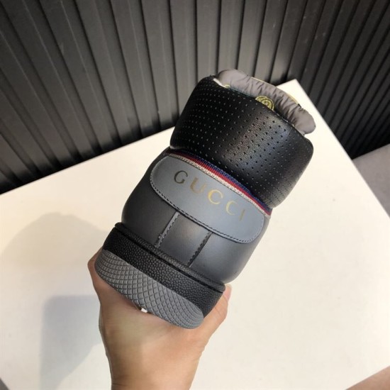 Gucci Screener GG High Top Trainer Heel Detail in grey and black Rear view of Gucci Screener GG high top trainer highlighting the grey leather heel panel with gold-tone branding in grey and black