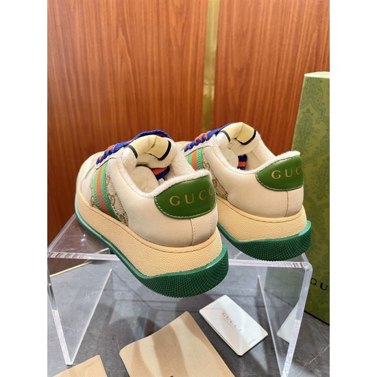Gucci Screener GG Monogram Trainers Heel View in beige and green Rear view of Gucci Screener trainers showing green leather heel counter with branding in beige and green
