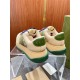 Gucci Screener GG Monogram Trainers Heel View in beige and green Rear view of Gucci Screener trainers showing green leather heel counter with branding in beige and green