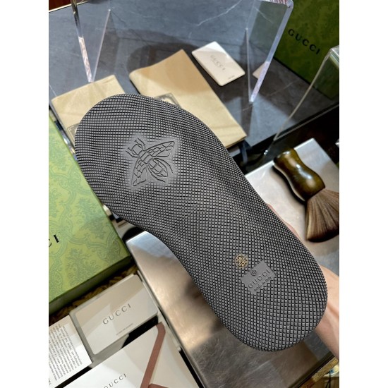 Gucci Screener GG Monogram Trainer Sole View in beige and green Textured outsole of Gucci Screener trainer featuring embossed bee logo in beige and green