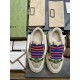 Gucci Screener GG Monogram Trainers Top View with Packaging in beige and green Top-down view of Gucci Screener trainers with blue and orange laces and packaging in beige and green