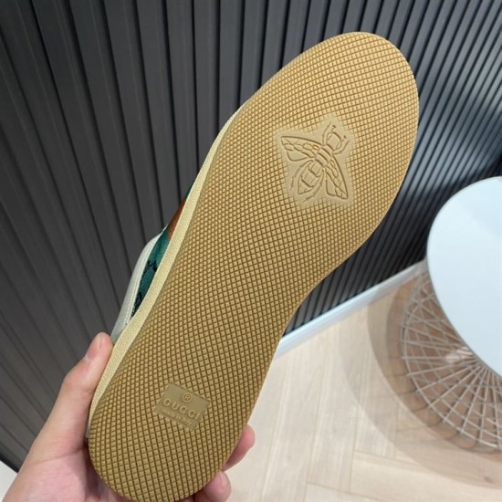 Gucci Screener Trainers Outsole Tread in beige and green Underside of Gucci Screener trainer rubber sole featuring bee motif traction in beige and green