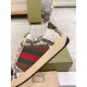 Gucci Screener Python Embossed Leather Trainer Side Detail in cream and green Close-up side view of Gucci Screener trainer showcasing python print texture and Web stripe detail in cream and green