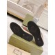 Gucci Screener Python Embossed Leather Trainers Outsole Tread in cream and green Underside view of black rubber soles on Gucci Screener trainers displaying the embossed bee motif in cream and green