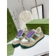 Gucci Screener Trainers Front Dynamic View in beige and green Front dynamic view of Gucci Screener beige leather trainers displaying blue laces in beige and green