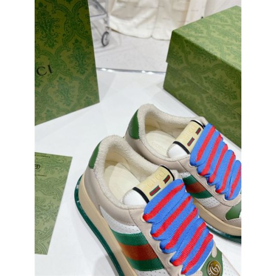 Gucci Screener Trainer Collar Detail in beige and green Top angle view of Gucci Screener trainer collar and tongue with branded patch in beige and green
