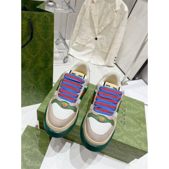 Gucci Screener Trainers Top-Down View in beige and green Top-down view of Gucci Screener trainers showcasing blue striped laces and perforated toe cap in beige and green
