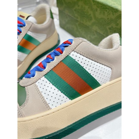Gucci Screener Trainer Web Stripe Detail in beige and green Detailed side shot of Gucci Screener trainer featuring green and red web stripe in beige and green