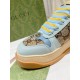 Detailed view of GG monogram toe box, Interlocking G logo and striped laces in light blue and beige