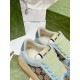Close-up of the tongue tag and padded collar on light blue Gucci Screener trainers in light blue and beige