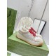 Beige Gucci Screener GG Lurex Platform Trainers Three-Quarter View Three-quarter view of beige Gucci Screener GG lurex platform trainers with red and green laces
