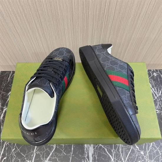 Gucci Black Monogram Web Trainers - Top View in black and white Top-down view of Gucci black monogram trainers showing the inner sole and outer web stripe in black and white