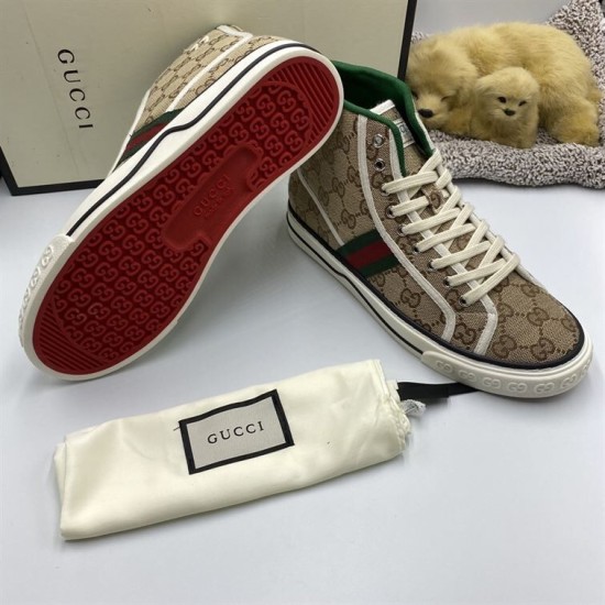 Red patterned rubber outsole and profile view of Gucci Tennis 1977 beige monogram high top trainers in beige and green