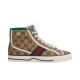 Full lateral side view of Gucci Tennis 1977 Monogram Canvas High Top Trainer in beige in beige and green