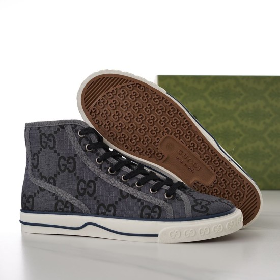 Gucci Tennis 1977 Outsole and Side View in grey Gucci grey high-top trainer displayed with brown patterned rubber tread