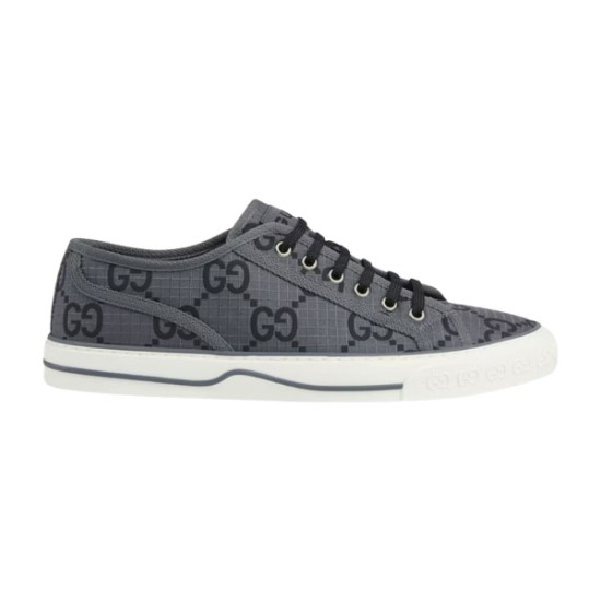 Side view of Gucci Tennis 1977 grey monogram low top trainers