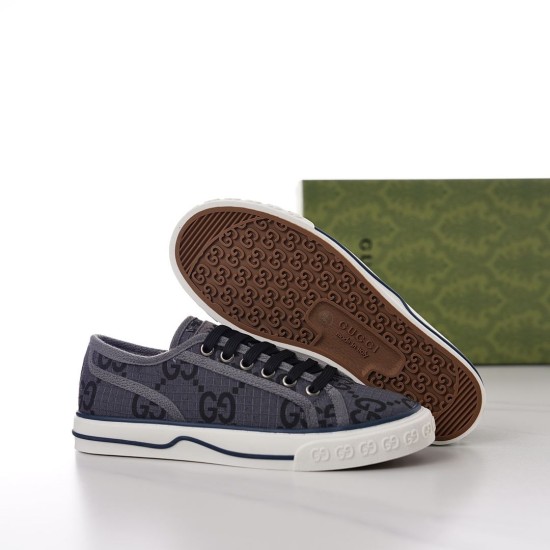 Grey Gucci Tennis 1977 trainer alongside rubber sole view