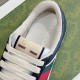 Close-up of Gucci Screener padded collar, soft towelling lining, and tongue logo patch in black and white