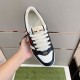 Top-down view of Gucci Screener trainer showcasing perforated white toe box and cream laces in black and white