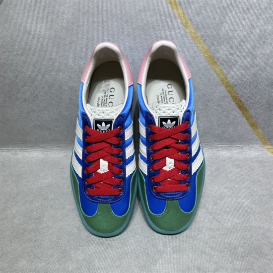 Gucci x Adidas Gazelle Top View in blue and white Top-down view of both blue satin Gucci x Adidas Gazelle trainers showing red laces and insoles in blue and white