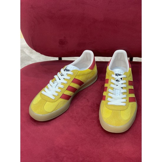 Front view of Gucci Yellow And Red Velvet Gazelle Low Top Trainers pair