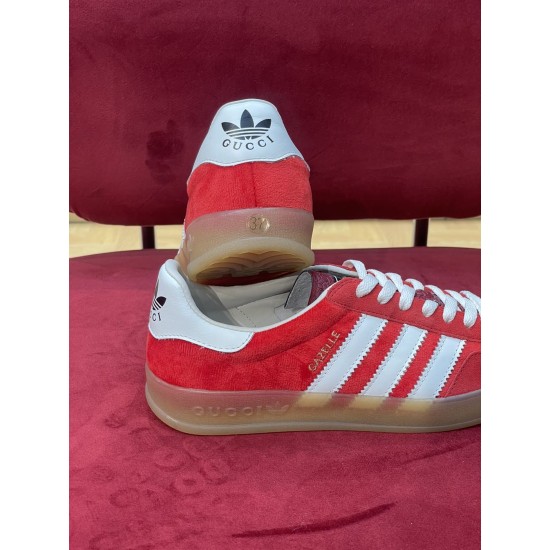 Gucci Gazelle Red Velvet Trainer Rear View in red and white Rear heel view showing white heel tabs and branded gum sole on red Gucci Gazelle trainers