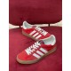 Gucci Gazelle Red Velvet Low Top Trainers Top View in red and white Top angled view of pair of Gucci Gazelle red velvet low top trainers in red and white