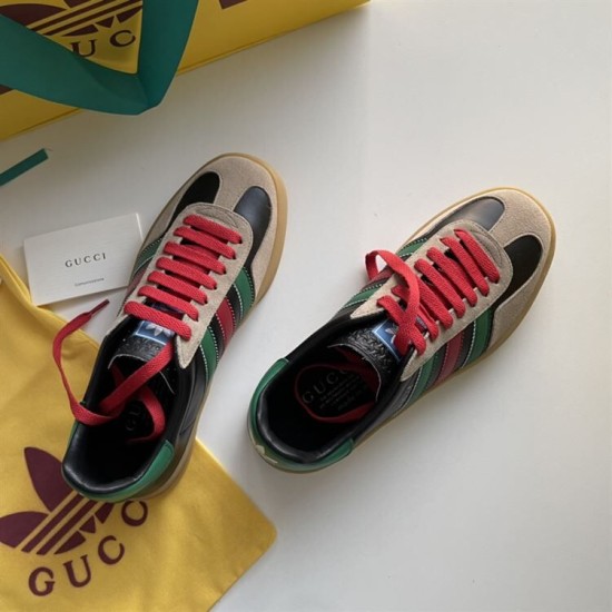 Gucci Gazelle Trainers Top-Down View in black and red Top-down view of Gucci Gazelle trainers in black leather with red laces, beige suede trim, and green accents