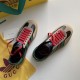 Gucci Gazelle Trainers Top-Down View in black and red Top-down view of Gucci Gazelle trainers in black leather with red laces, beige suede trim, and green accents