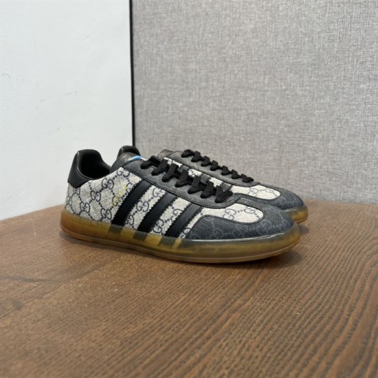 Angled perspective of beige and black Gucci Men's Gazelle Monogram Canvas Low-Top Trainers