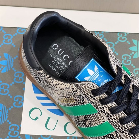 Gucci Snakeskin Pattern Low Top Trainers Grey Green Collar Detail Close-up view of Gucci Snakeskin Pattern Low Top Trainers Grey Green tongue and collar