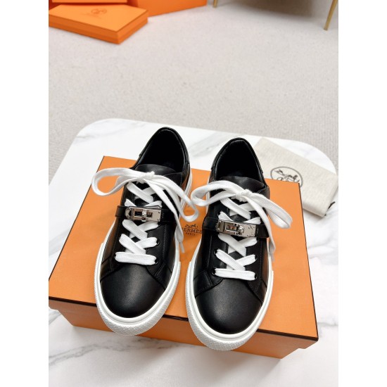 Hermes Day Black Leather Trainers Top View in black and white Top-down view of Hermes Day black leather trainers with metallic buckle strap detail in black and white