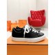 Hermes Day Black Leather Trainers Profile View in black and white Side profile of Hermes Day black leather trainers sitting on an orange box in black and white