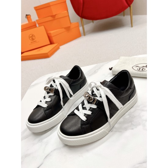 Hermes Day Black Leather Trainers Front Angle in black and white Angled perspective of Hermes Day black leather trainers with white laces