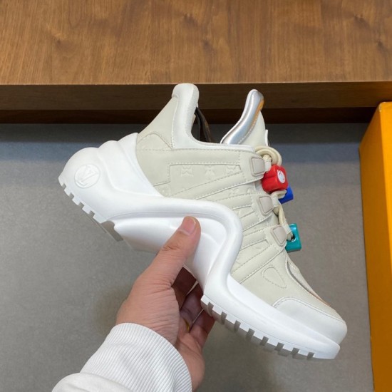 Lateral View of Cream L Archlight Chunky Sneaker in cream and white Side profile of the cream L Archlight sneaker showing the oversized white sole
