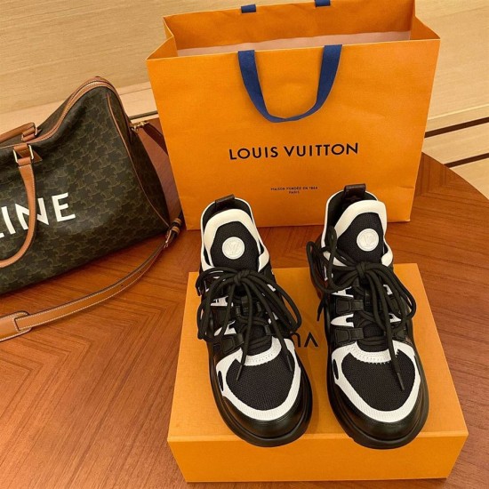 L Archlight Chunky Monogram Arch Sole Trainers Front Pair in black and white Direct front view of the pair showcasing the high tongue and contrast white trim in black and white