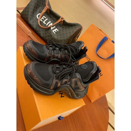 L Archlight Chunky Monogram Trainers In Black And Brown Overhead View L Archlight chunky monogram trainers in black and brown arranged in a pair overhead