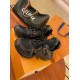 L Archlight Chunky Monogram Trainers In Black And Brown Overhead View L Archlight chunky monogram trainers in black and brown arranged in a pair overhead