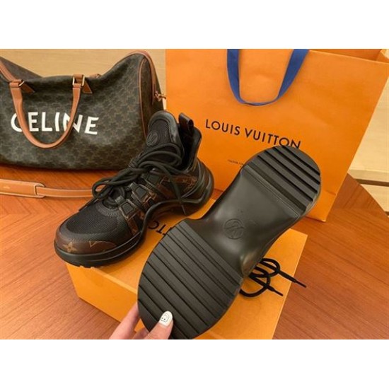 L Archlight Chunky Monogram Trainers In Black And Brown Sole View Underside tread pattern shown alongside the L Archlight trainers in black and brown